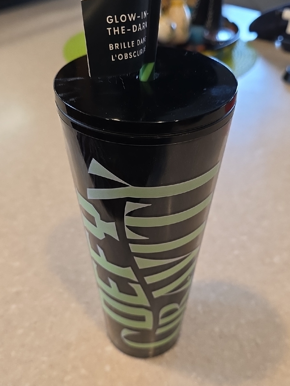 Wicked Glow-In-The-Dark Cosmetic Tube — Black with Mint Green Logo